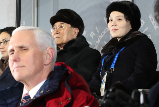 US Vice President Mike Pence (front row), North Korean leader's younger sister Kim Yo-jong (right, back row) and North Korean ceremonial head of state Kim Yong-nam (second from right, back row) attend the opening ceremony of the 2018 Winter Olympics held at PyeongChang Olympic Plaza on Feb. 9. (Yonhap)