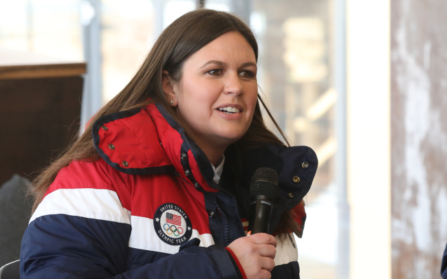 White House press secretary Sarah Sanders talks at a briefing held at the USA House in Yongpyong Resort on Saturday. (Yonhap)