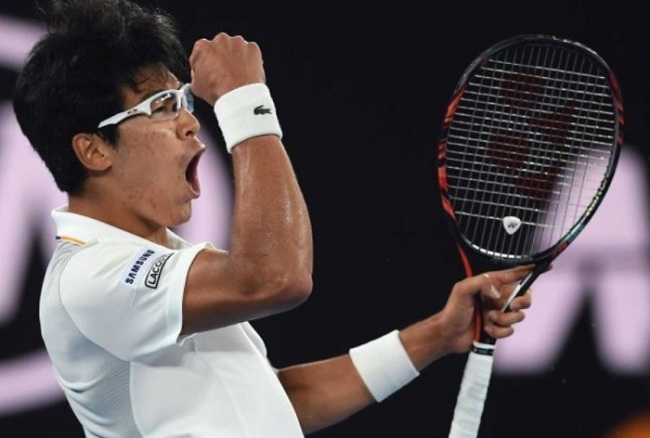 South Korea's Chung Hyeon pumps his fist after winning a point against six-time champion Novak Djokovic at the Australian Open 2018 (AP)