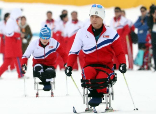 North Korea's para Nordic skier Ma Yu-chol, front right, and Kim Jong-hyon train for the PyeongChang Winter Paralympics at Alpensia Biathlon Centre in PyeongChang, Gangwon Province, on March 8. (Yonhap)