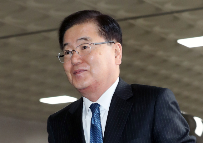 Top security advisor Chung Eui-yong appears at Gimpo International Airport on his way to China on Monday. (Yonhap)
