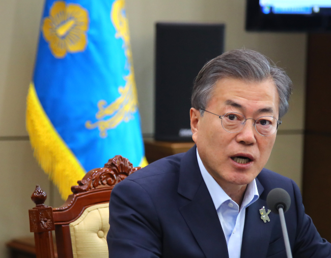 President Moon Jae-in speaks at a weekly meeting with his presidential aides, held at his office Cheong Wa Dae on Monday. (Yonhap)