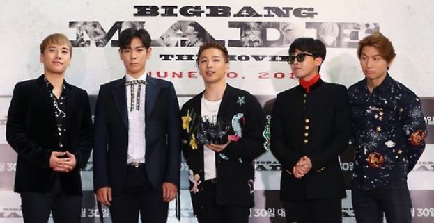 K-pop act Big Bang poses for photos during a publicity event for the movie "Big Bang Made" in Seoul on June 28, 2016. (Yonhap)