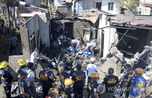 경비행기 추락 사고 현장 [AP=연합뉴스]