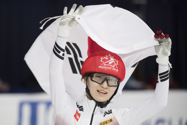 Choi Min-jeong of South Korea celebrates clinching the overall title at the International Skating Union World Short Track Speed Skating Championships at Maurice Richard Arena in Montreal on Sunday. (AP-Yonhap)