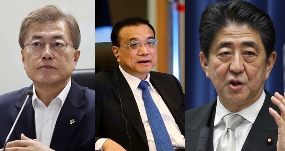 From left: South Korean President Moon Jae-in, Chinese Premier Li Keqiang and Japanese Prime Minister Shinzo Abe. (AP)