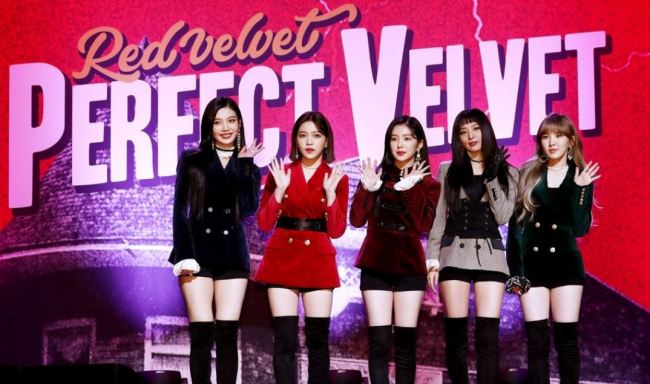 Red Velvet performing Red Flavor in Pyongyang during the 2018 inter-Korean cultural exchange, one of the mainstream Korean girl group party staples