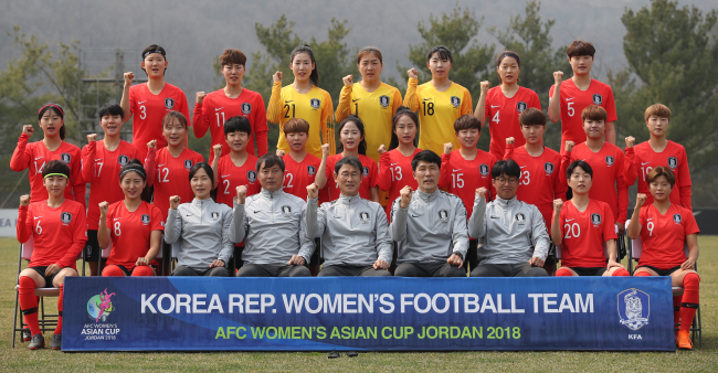 South Korea women's national football team players and coaching staff pose for a photo at the National Football Center in Paju, north of Seoul on Tuesday. (Yonhap)