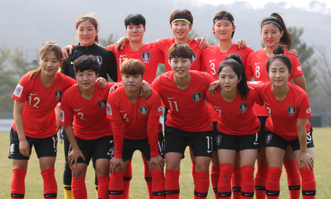 South Korea women's national football team players pose for a photo at the National Football Center in Paju, north of Seoul, on March 27. (Yonhap)