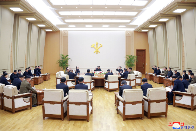 This photo, carried by North Korea's state news agency on April 10, 2018, shows North Korean leader Kim Jong-un presiding over a meeting of the Political Bureau of the Central Committee of the ruling Workers' Party of Korea a day earlier. (For Use Only in the Republic of Korea. No Redistribution) (Yonhap)
