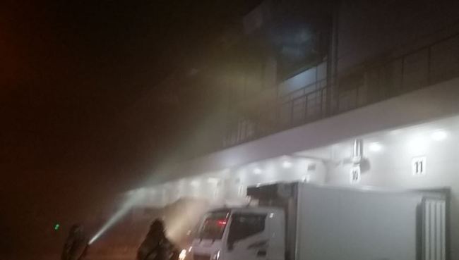 Firefighters extinguish the warehouse fire in Ansan, Gyeonggi Province on Friday, April 13. Yonhap