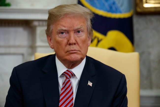 In this April 10 file photo, President Donald Trump listens as he meets in the Oval Office of the White House, in Washington. Trump said Thursday, April 12, that an attack on Syria could take place “very soon or not so soon at all!” (AP