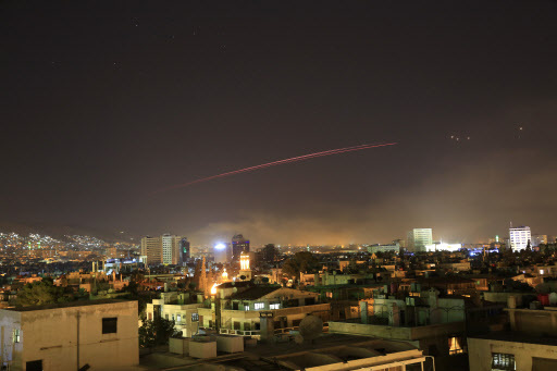 Damascus skies erupt with anti-aircraft fire as the U.S. launches an attack on Syria targeting different parts of the Syrian capital Damascus, Syria, early Saturday, April 14, 2018. Syria's capital has been rocked by loud explosions that lit up the sky with heavy smoke as U.S. President Donald Trump announced airstrikes in retaliation for the country's alleged use of chemical weapons. (AP)