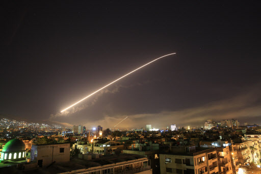 The Damascus sky lights up missile fire as the U.S. launches an attack on Syria targeting different parts of the capital early Saturday, April 14, 2018. Syria's capital has been rocked by loud explosions that lit up the sky with heavy smoke as U.S. President Donald Trump announced airstrikes in retaliation for the country's alleged use of chemical weapons. (AP)