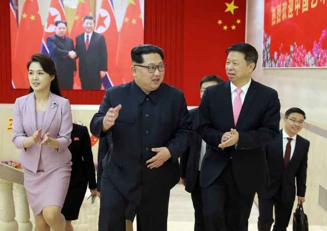 North Korean leader Kim Jong-un meets Song Tao, the head of the Chinese Communist Party’s International Department, who led a Chinese art troupe to North Korea. (KCNA-Yonhap)