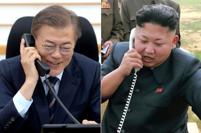 File photo of leaders of South and North Korea respectively on phone (Yonhap)