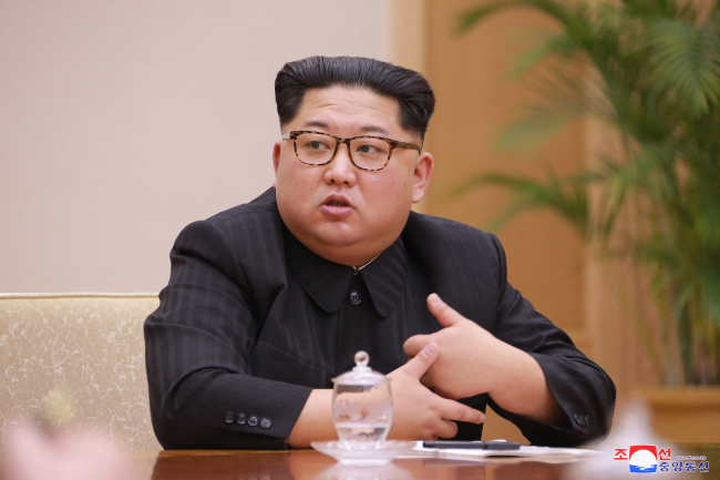 North Korean leader Kim Jong-un is seen speaking to party officials in a file photo from April 9. Yonhap