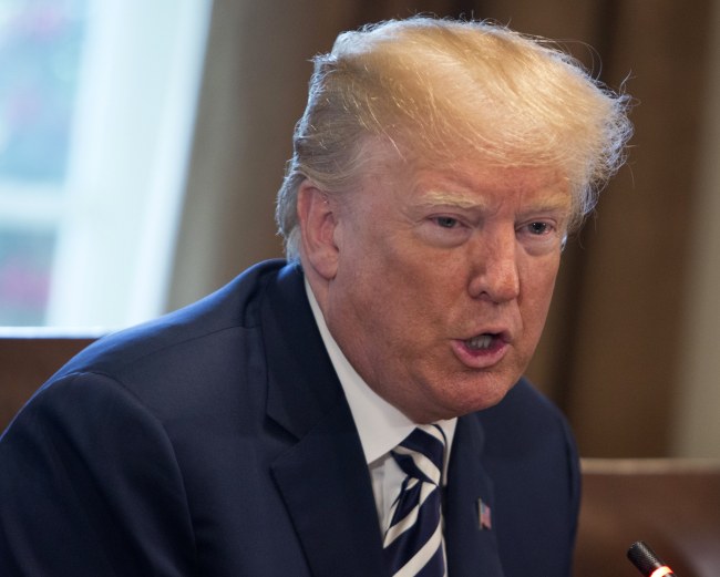 US President Donald J. Trump sits for a meeting with French President Emmanuel Macron (not pictured) at the White House in Washington, DC, USA, 24 April 2018. (EPA-Yonhap)