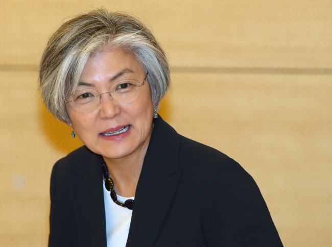 Foreign Minister Kang Kyung-wha enters the venue of the event hosted by the Korea Peace Foundation, held at World Culture Open Korea in central Seoul, on Wednesday. (Yonhap)