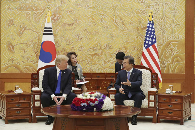 President Moon Jae-in and US President Donald Trump during their third summit meeting in Seoul on Nov. 7. Cheong Wa Dae