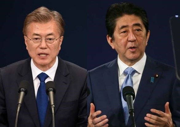 South Korean President Moon Jae In (left) and Japanese Prime Minister Shinzo Abe (Reuters)