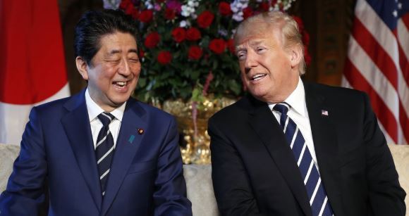 Japanese Prime Minister Shinzo Abe with US President Donald Trump (AP-Yonhap)