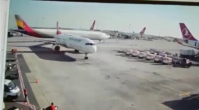 A YouTube capture of CCTV shows the collision between two planes in Istanbul on Sunday. YouTube