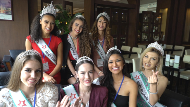 Contestants of the 10th Miss SuperTalent beauty pageant pose for the camera at a cafe in Gangnam, Seoul, Tuesday. (Lim Jeong-yeo/The Korea Herald)