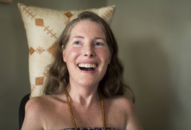 In this Sunday, July 24, 2016, file photo provided by Niels Alpert, Betsy Davis smiles during her "Right To Die Party" in Ojai, Calif. Davis through herself the party as she became one of the first to use a California law to take her own life in 2016. Advocates say the terminally ill may die tougher deaths after a judge on Tuesday, May 15, 2018, threw out the law that allows adults to obtain a prescription for life-ending drugs. (Niels Alpert via AP, File)