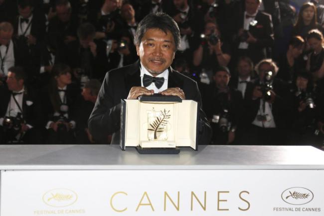 Director Hirokazu Kore-eda Palme d'Or award winner for his film "Shoplifters" (Manbiki kazoku) poses for the cameras after the closing ceremony of the 71st international film festival, Cannes, southern France on May 19. (Reuters)