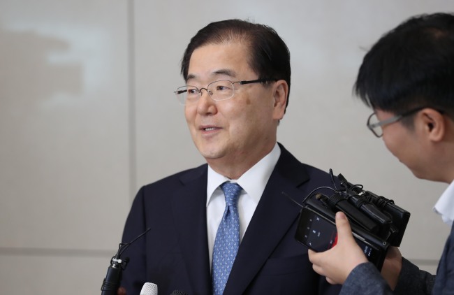In this file photo from May 5, 2018, Chung Eui-yong, South Korea's top presidential security adviser, speaks to reporters at Incheon International Airport after returning from a meeting with US national security adviser John Bolton. (Yonhap)