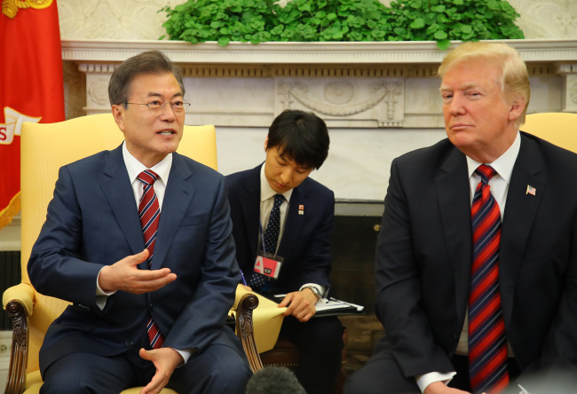 President Moon Jae-in and US President Donald Trump responds to questions from the media at the White House on Tuesday. Yonhap