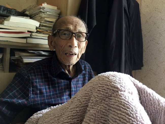 Former North Korean spy Seo Ok-yeol, 89, who spent 29 years in a prison, speaks during an interview at his home in Gwangju, South Korea on May 10. (AP)