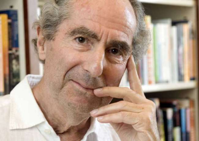 In this Sept. 8, 2008, file photo, author Philip Roth poses for a photo in the offices of his publisher, Houghton Mifflin, in New York. (AP)