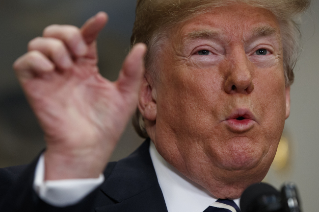 US President Donald Trump speaks about his cancellation of the planned summit in Singapore with North Korean leader Kim Jong-un, in the Roosevelt Room of the White House in Washington on Thursday. (Yonhap)