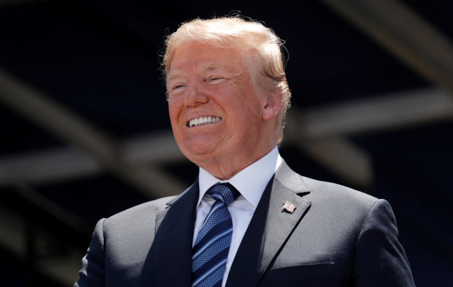 US President Donald Trump grins at the commissioning and graduation ceremony for U.S. Naval Academy Class of 2018 at the Navy-Marine Corps Memorial Stadium in Annapolis (Reuters)