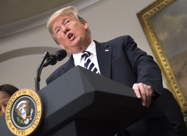 US President Donald Trump speaks on the recent cancelation of his meeting with North Korean Leader Kim Jong-Un, prior to signing the S. 2155 - Economic Growth, Regulatory Relief, and Consumer Protection Act, at the White House on May 24 (UPI-Yonhap)