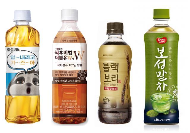왼쪽부터 웅진식품 ‘하늘보리’ 시즌한정판ㆍ코카콜라 ‘태양의 식후비법 더블유W차’ㆍ하이트진로음료 ‘블랙보리’ㆍ동원 ‘보성말차’.