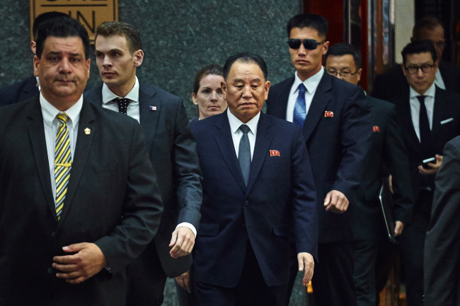 North Korea's Kim Yong Chol, center, leaves a hotel in New York, Wednesday, May 30. (Yonhap)