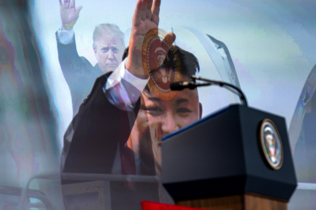 A short video, produced by the White House for US President Donald Trump to show North Korean leader Kim Jong-un during their historic summit, screens for journalists awaiting a Trump press conference at the Capella Hotel in Singapore on Tuesday. (EPA-Yonhap)