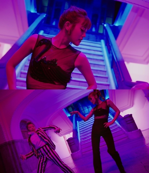 A music video teaser image for Minseo’s upcoming single “Is Who” (Mystic Entertainment)
　