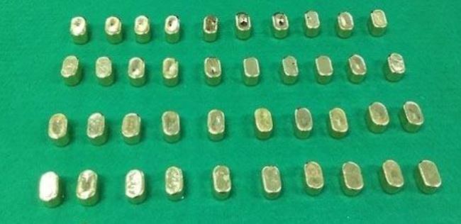This undated file photo, released by the customs office in Incheon, west of Seoul, shows gold nuggets that two women smuggled from China to South Korea. (Yonhap)