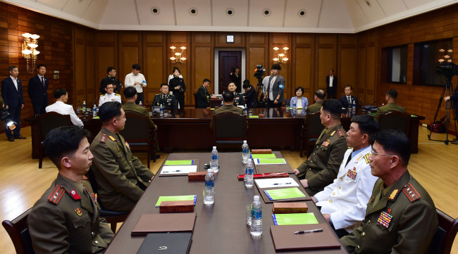 The photo, taken June 14, 2018, shows military officials from South Korea and North Korea holding high-level talks at Tongilgak, a facility located on the North Korean side of Panmunjeom inside the Demilitarized Zone that divides the two Koreas. (Yonhap)