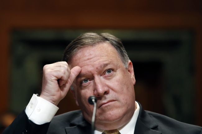 US Secretary of State Mike Pompeo listens while appearing before a Senate Appropriations subcommittee on the FY2019 budget, Wednesday, at Capitol Hill in Washington.  (AP-Yonhap)