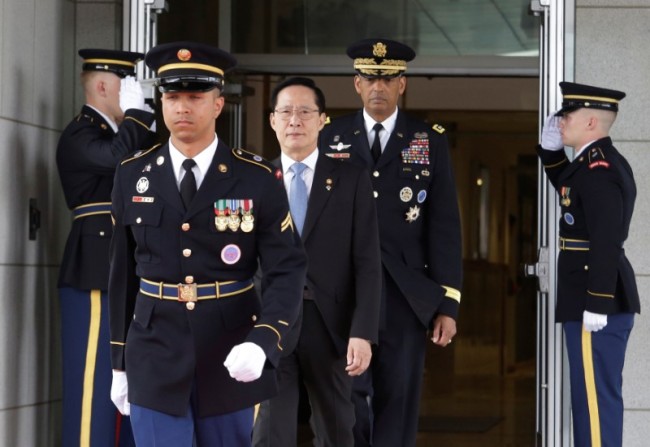 South Korean Defense Minister Song Young-moo and US Gen. Vincent Brooks, commander of the United Nations Command, US Forces Korea and Combined Forces Command, arrive to attend an opening ceremony for the new headquarters of USFK on June 29. (Reuters)