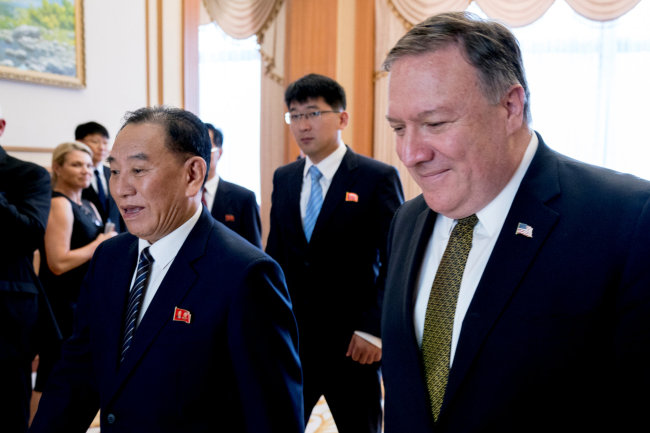Secretary of State Mike Pompeo, right, and Kim Yong Chol, left, a North Korean senior ruling party official and former intelligence chief, arrive for a lunch at the Park Hwa Guest House in Pyongyang, North Korea, Saturday, July 7, 2018. (Reuters)