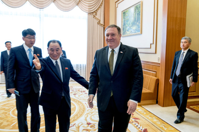 Secretary of State Mike Pompeo, right, and Kim Yong Chol, left, a North Korean senior ruling party official and former intelligence chief, arrive for a lunch at the Park Hwa Guest House in Pyongyang, North Korea, Saturday, July 7, 2018. (Reuters)