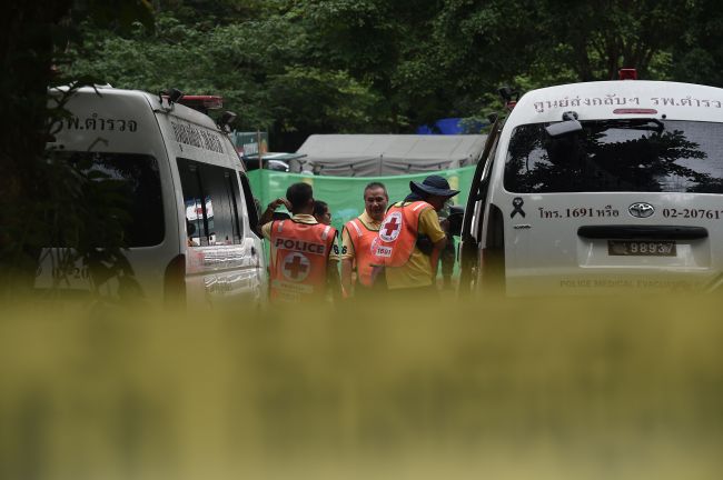 Ambulance with medical personnel head to Tham Luang cave area as divers began evacuation of the 12 boys and their coach trapped at the cave in Khun Nam Nang Non Forest Park in the Mae Sai district of Chiang Rai province on July 8. On the day, elite divers began the extremely dangerous operation to extract 12 boys and their football coach who have been trapped in a flooded cave complex in northern Thailand for more than two weeks, as looming monsoon rains threatened the rescue effort. (AFP-Yonhap)