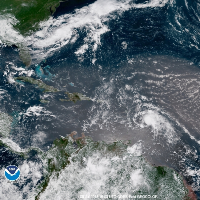 In this geocolor image GOES-16 satellite image taken Sunday, July 8, 2018, at 15:00 UTC, shows Tropical Storm Beryl, center right, moving across the Lesser Antilles in the eastern Caribbean Sea, and Tropical Storm Chris, top left, off the US East Coast. (AP)