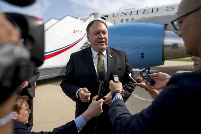 In this July 7 file photo, US Secretary of State Mike Pompeo speaks to members of the media following two days of meetings with Kim Yong-chol, a North Korean senior ruling party official and former intelligence chief, before boarding his plane at Sunan International Airport in Pyongyang, North Korea. (Yonhap)